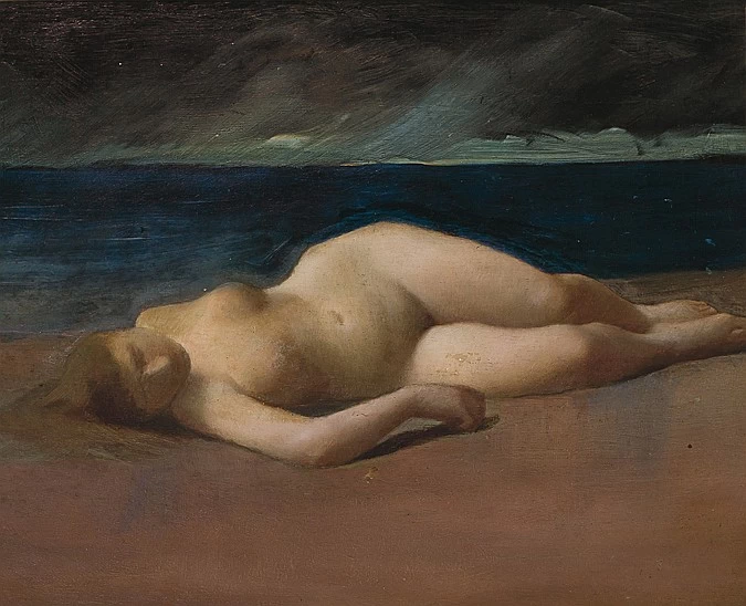 Nudo sdraiato sulla spiaggia